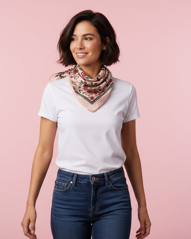 Patterned product with red floral design on a beige background, featuring the brand 'yolotti'.